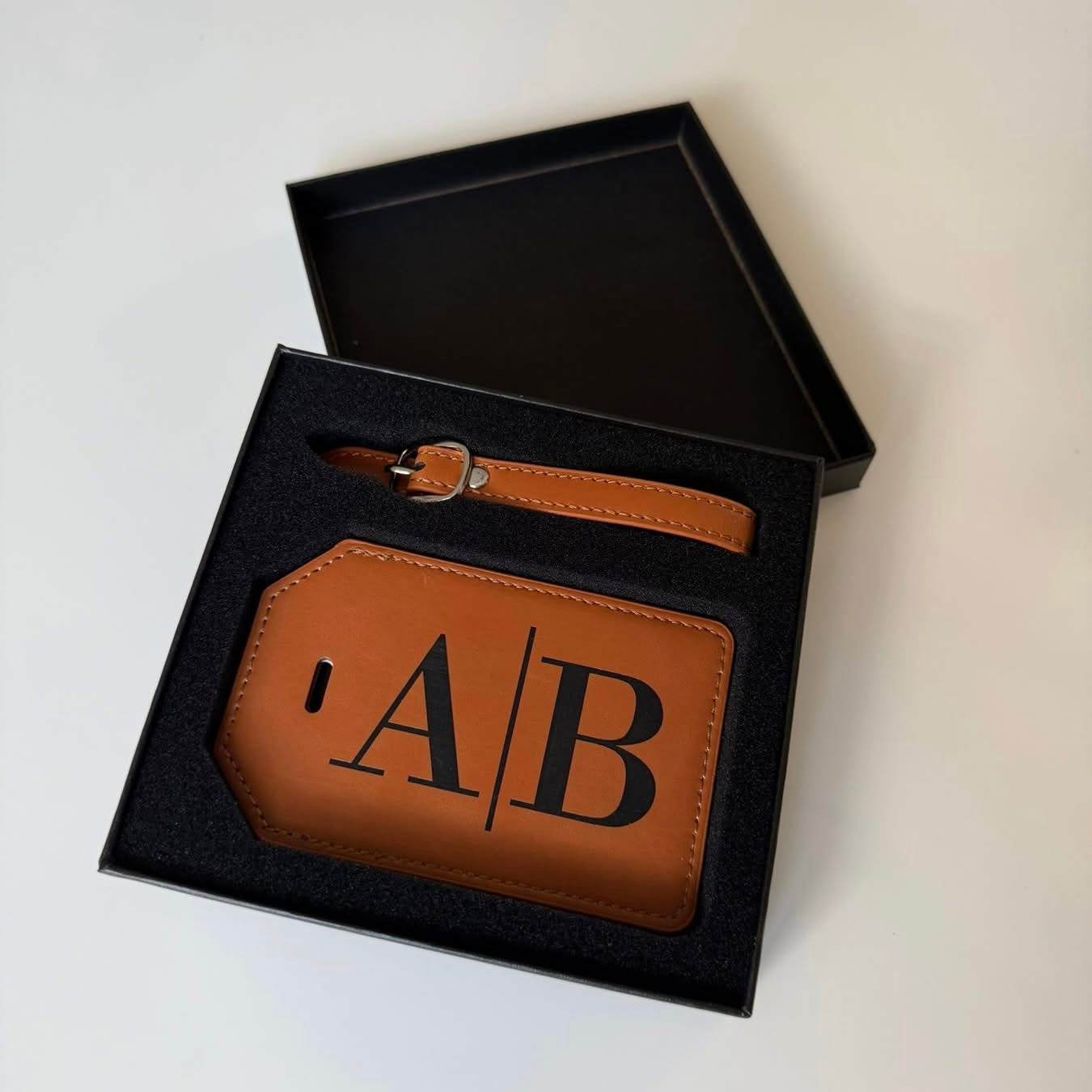 Personalized MakerFlow luggage tags with clear identification window and simple design for easy baggage tagging.