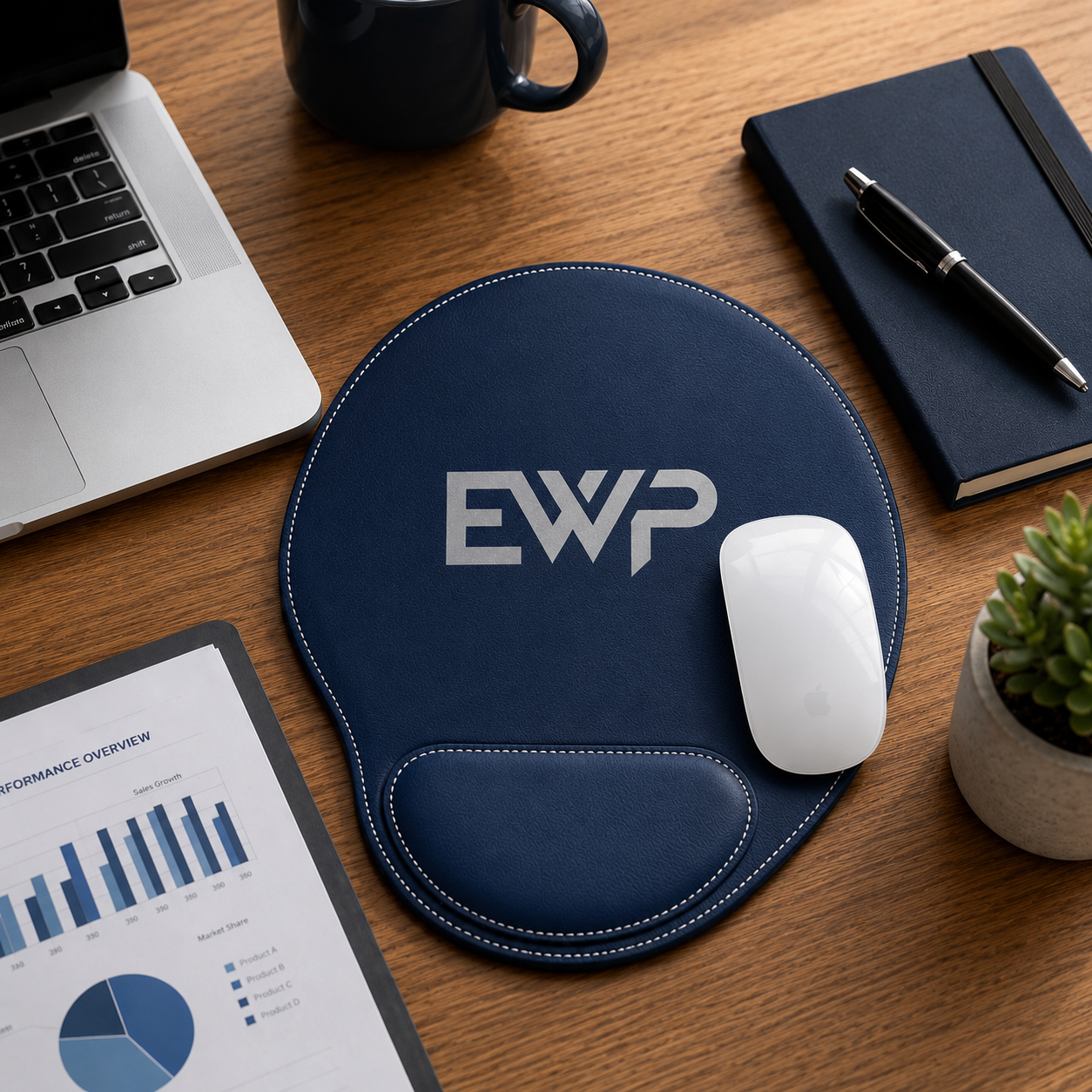 Navy blue mouse pad with a logo on a desk