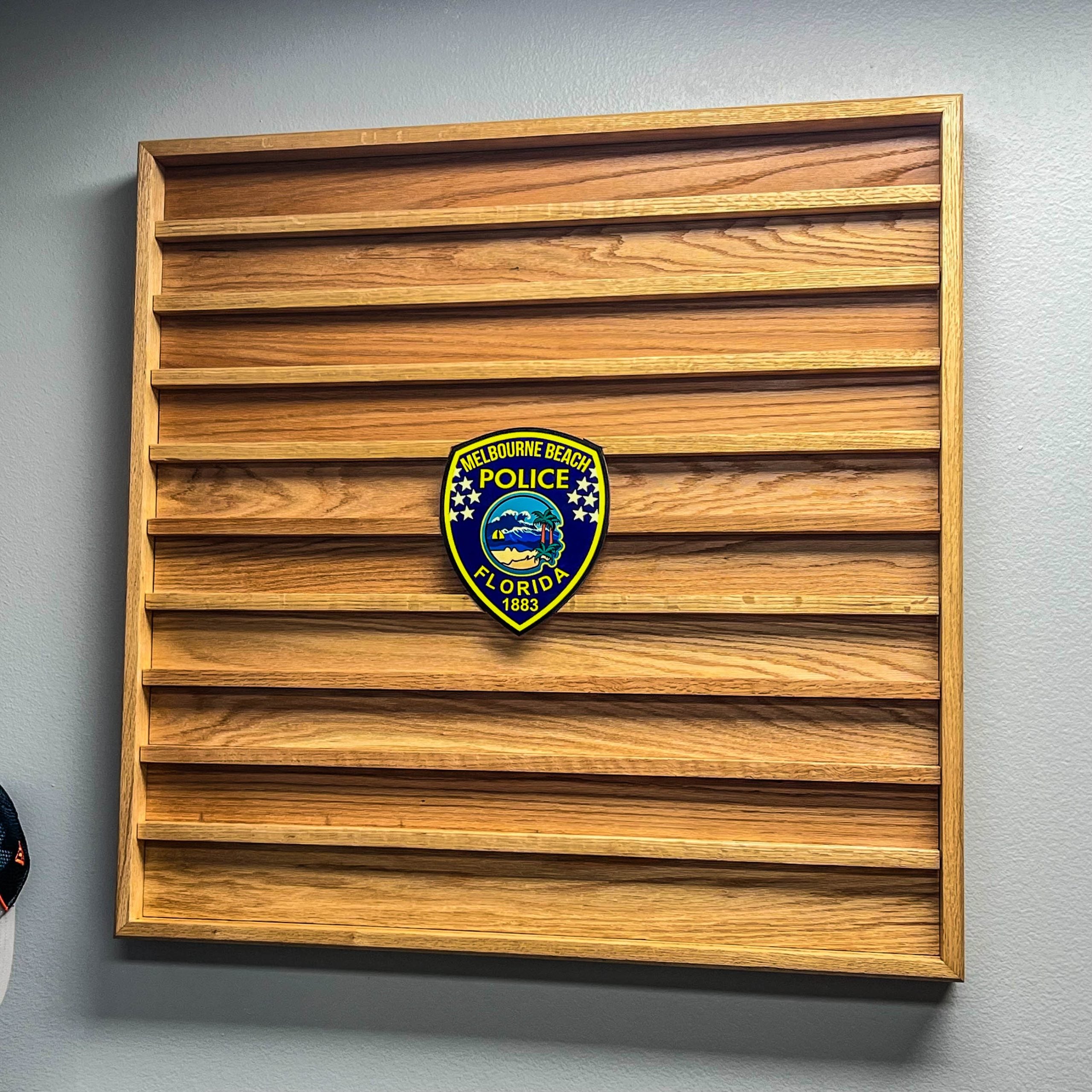 wall mounted coin holder with agency patch